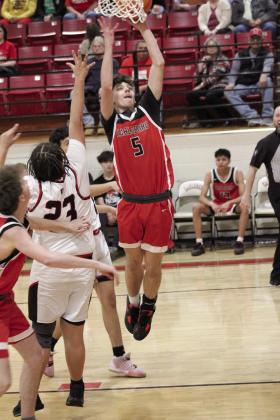 Earlsboro senior Trystan Black goes to the hoop in the fourth quarter of the Class B Regionals on Feb. 15. The Wildcats won, 79-33, but lost the regional game with Varnum, Feb. 17, 65-78. They will play in Area competition today (Feb. 22) in Bridge Creek at 7:30 pm. Countywide &amp; Sun/Natasha Dunagan