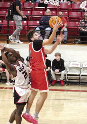 Earlsboro senior James Smith makes a basket in the third quarter of the Class B Regionals.
