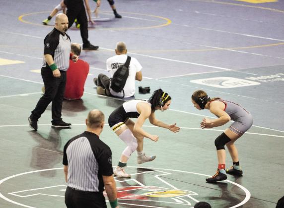 Tecumseh’s Vivian Hayes sizes up her opponent from McLoud at the State Wrestling finals on Feb. 25. Photo provided by Kenetta Lisenbee.