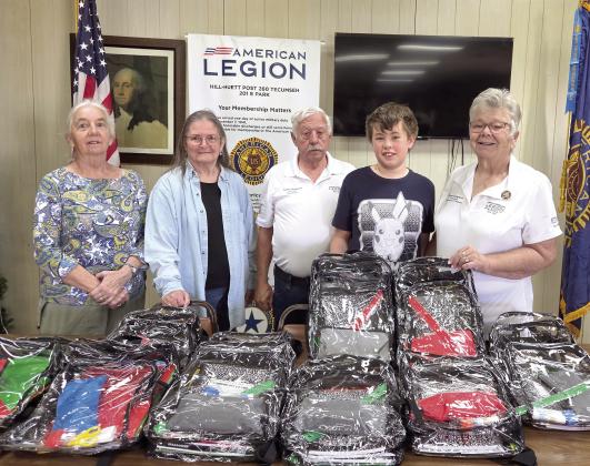 Tecumseh's American Legion Hill-Huett Post 260 donated 10 backpacks filled with school supplies to Cross Timbers Elementary School on Aug. 5. Shown, from left, are Auxiliary members Carolyn Rose and Julia Watters; Post Commander Tom Snodgrass, Sons of the American Legion; Daryl Murray and Oklahoma Auxiliary Department President Donna Snodgrass. Photo provided