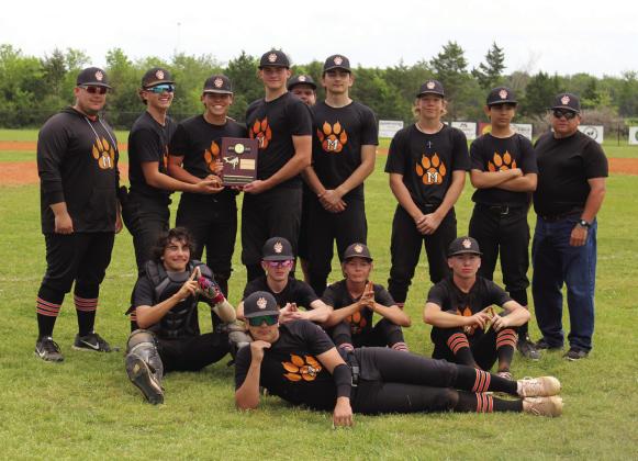 The Maud Tigers pose with Head Coach Dalton Martin and their Class B District Champions trophy after winning against Earlsboro on April 18. On April 17, they beat Earlsboro, 12-2, and Bowlegs, 22-9, and on April 18, the score was 21-4. Maud will play in regionals in Calumet, beginning today (April 25) at 11 am.