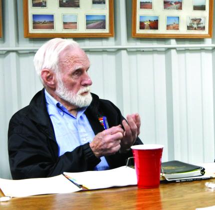 Dr. Joe Taron discusses rural water history with members of the Pottawatomie County Development Authority (PCDA). File photo