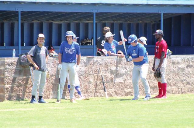 Participants from Bethel, Harrah, and Luther, among other places, wait their turns during the First Annual Pottawatomie County Prospect Camp, held at Bethel June 27. The two from Bethel are Paul Villegas, far left, and Matthew Sharp. Countywide &amp; Sun/Natasha Dunagan
