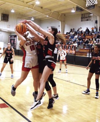 Earlsboro’s Homecoming Princess, Peighton Worley fights for the bucket in the homecoming game against Strother. The home team came through with a 61-27 win on Dec. 13.