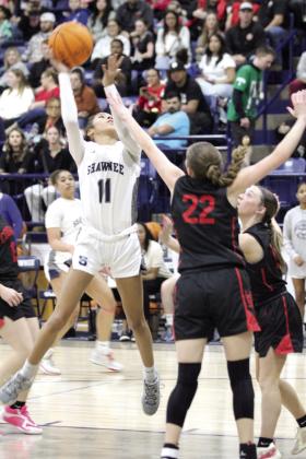 Shawnee junior Tarilyn Thierry aims for the basket during the Feb. 8 home game against North Rock Creek. The Lady Wolves lost, 46-59.