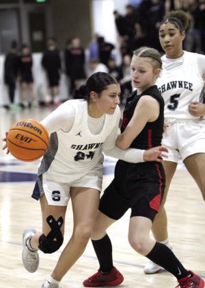 Shawnee's Kaitlyn Taylor drives to the basket.