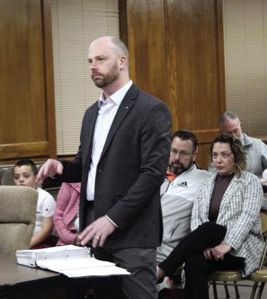 Michael Kemper, a representative from Jenkins and Kemper, CPA, gives the 2021-22 fiscal year audit report of Shawnee Public Schools at the Jan. 9 Shawnee Board of Education meeting.
