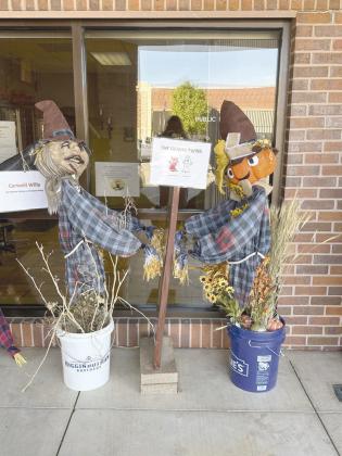 “The Gemini Twins,” by Leslie Hubbard and Whitney Abel, won first place out of three entries in the City of Tecumseh Employees Scarecrow Contest. Photos provided by Cathy Condit.