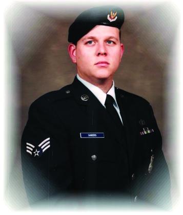Tecumseh Police Sergeant J.D. Sanders is shown in dress uniform for the Air National Guard in 1996.