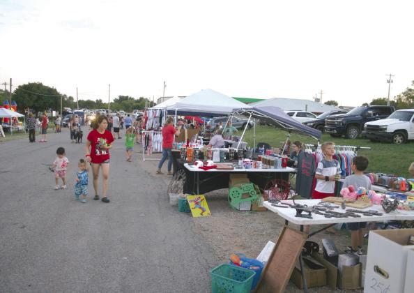 About 32 vendor booths were open along Main Street for the Second Annual Macomb 21st CCLC Trade Days on Sept. 28. Besides shopping, they offered inflatables, live music and food trucks. Program director Shannon Browning said the next 21st Century Community Learning Centers engagement event will be the Glow n’ Grow Trunk or Treat on Oct. 26, with a word search from 5-6 pm and a carnival from 6-8 pm. Countywide &amp; Sun/Natasha Dunagan