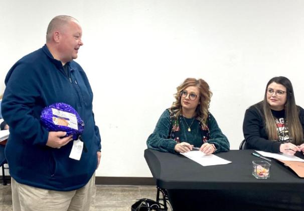 Rep. Dell Kerbs challenged elected officials at the Pottawatomie County Commissioners meeting to donate a ham to a family or charity for the holidays.