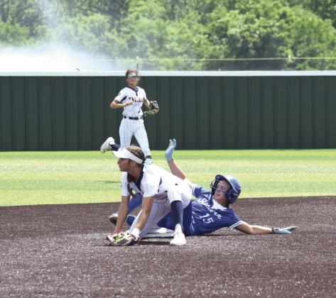 Madi Doty catches the ball just ahead of Eastern's Brooklyn Duff to score the out at second base for Seminole. Julie Talton, Countywide &amp; Sun