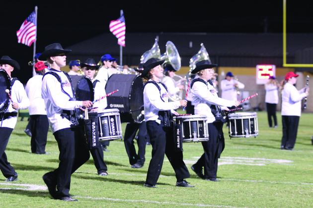 The Savage Pride Marching Band performs their “America the Beautiful” show at the Oct. 10 Tecumseh football game. They got a Superior rating in the OSSAA Regional Marching Band Contest on Oct. 22, according to Tecumseh High School’s Facebook post.