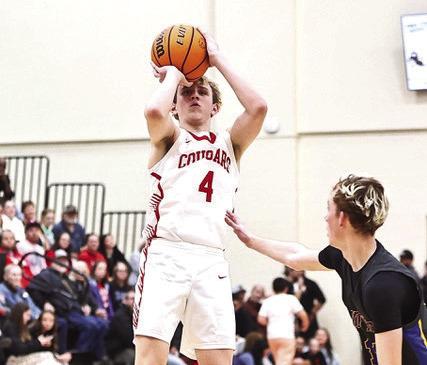Grey Gains puts up a shot for the Cougars.
