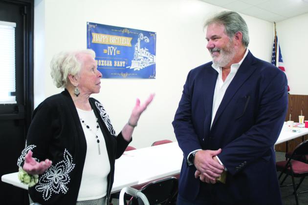 “Boxcar Baby” Ivy Winter talks with Shawnee Mayor Eric Stephens during her 95th birthday party, held at the Pottawatomie County Historical Society Museum on Dec. 12. Winter was born on a boxcar in Shawnee on Dec. 14, 1929. Countywide &amp; Sun/Natasha Dunagan