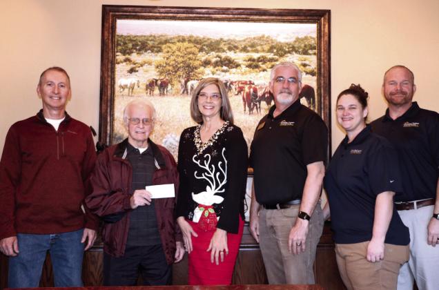 On Dec. 14, from left, Pottawatomie County Facilities Authority ViceChairman Tom Wilsie and Pottawatomie County Facilities Authority Chairman Leonard Taron present a $6,500 check to Gordon Cooper Superintendent Julie McCormick, Gordon Cooper Certified Health Programs Coordinator Rusty Gilpin, Gordon Cooper EMS Lab/Clinical Coordinator Lacie Smith, and Gordon Cooper EMS Instructor Curtis Rhodes. Gordon Cooper Techology Center will use the money to buy new equipment for their EMS program.