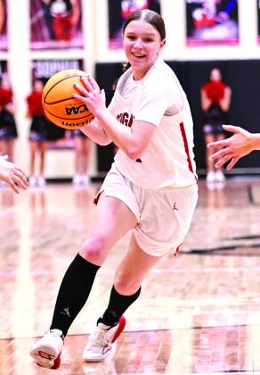 North Rock Creek’s Addisen Lawrence drives the lane.