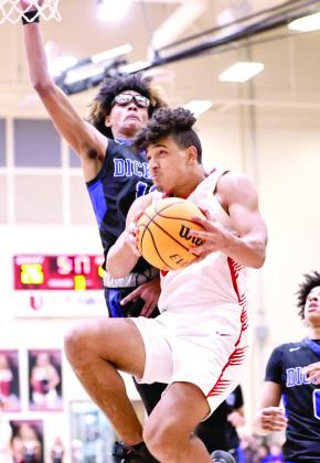 North Rock Creek’s Caleb Hawkins goes for the layup.