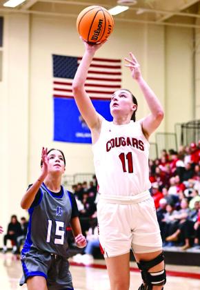 North Rock Creek’s Lydia VanAntwerp shoots the layup.