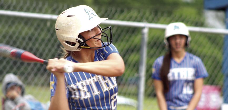 Bethel junior Bailey Tucker prepares to tag a triple during the first home game against Okmulgee in the Class 5A District Slow Pitch Tournament on April 23. The Lady Wildcats won both games, 13-0 and 15-1, to become District Champs. Photos by Natasha Dunagan, Countywide &amp; Sun. Click on the camera banner ad below for more photos from the game!