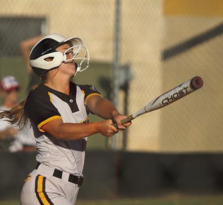 Tecumseh senior Jessi Hull takes a swing but gets to walk during the fourth inning.