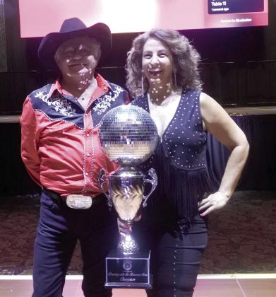 Rachael Melot and Tim Russell were awarded the Disco Ball as the 2025 winners of Dancing With Shawnee.