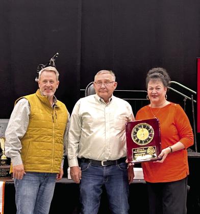 Pictured from left Matt Griffith, PCJLS Honoree John Grundmann, and Suzanne Gilbert.