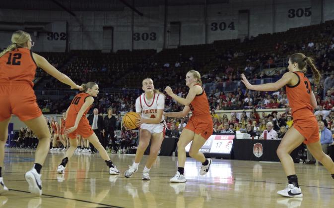 Ava Bell wards off Merritt in the paint to score two for Dale.