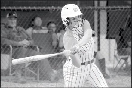 Maud’s Jaycee Pack bites her jersey as she hits a double in the second inning of Class B District Tournament action against Varnum.