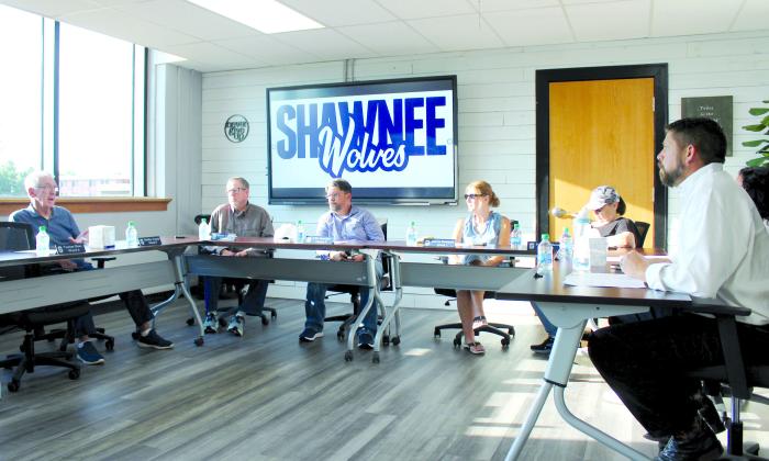 Shawnee Board of Education Clerk Bobby Canty, far left, speaks during the special session meeting at 8 a.m. on July 18. Also shown are Russ Oliver, Clif Harden, Jeanne Swinney, Mandy Hillhouse, Kristen Wilson (hidden) and Dr. Aaron Espolt. The meeting was held in the professional development center on the first floor of the Administration Building due to remodeling in the board room upstairs. Countywide &amp;amp; Sun/ Natasha Dunagan