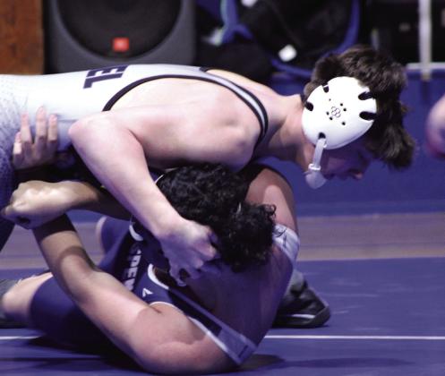 Bethel senior Zane Anderson pins his Star Spencer opponent for the win during the Bethel Tri-Dual and Senior Night on Jan. 20. The Wildcats also faced Mount St. Mary's wrestlers.
