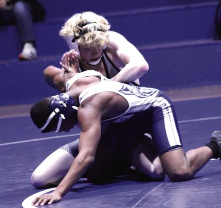 Bethel's Weslee Lindsey wears down his Star Spencer opponent before pinning him during the Bethel Tri-Dual and Senior Night on Jan. 20.