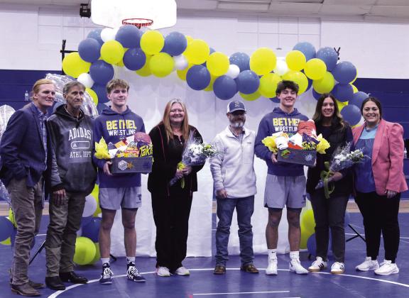 Bethel High School held their Wrestling Senior Night on Jan. 20 and honored seniors Zac Griffith and Zane Anderson. Shown, from left, are Wrestling Coach Aaron Smith, Roger Griffith, Griffith, Mary Griffith, Ryan Anderson, Anderson, Susan Hudgins and Coach Maggie Smith. Photos by Natasha Dunagan, Countywide &amp; Sun