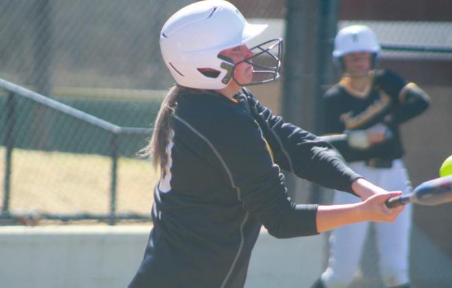 Tecumseh junior Cadence Oliver hits a single in the game against North Rock Creek during the Harrah Tournament, held at the FireLake Ball Fields on March 24. The Tecumseh Lady Savages lost 2-4.
