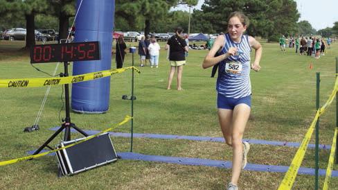 Bethel sophomore Claira Arnold crosses the finish line in fourth place out of 44 total with a time of 14:50.44 in the North Canadian River Conference Cross Country Meet, held at THS on Sept. 16. Natasha Dunagan, Countywide &amp;amp; Sun