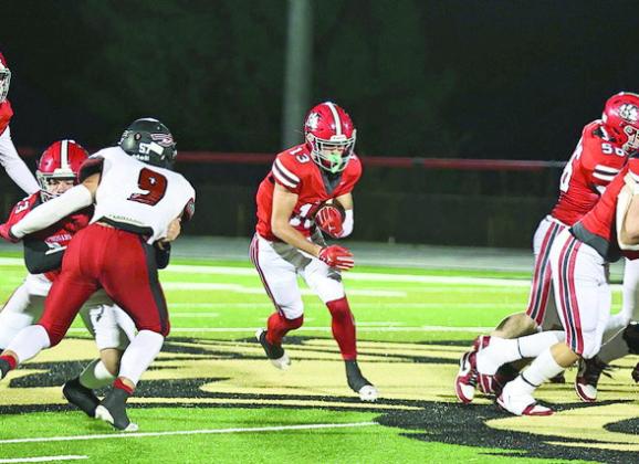 NRC's Reid Rollins finds a big hole for a first down. NRC lost to Plainview 21-18 on Halloween. They will play their last regular season (senior night) game against Anadarko on Nov. 7. Photo Courtesy of Gowin Photography