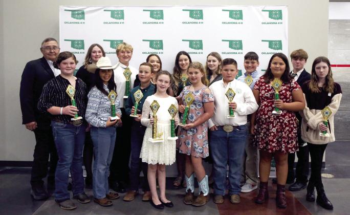 Pottawatomie County Farm Bureau fair high point awards were presented to the following students at the 4-H Achievement Banquet recently held at North Rock Creek School. Front row from left: Colleen Williams, Alissa Powell, Legend Baker, Tacyie Baker, Emily Davis, Alex Hurst, Braelin Lincoln, and Adalynn Larson. Back row from left: John Grundmann, Maygn Alls, Andrew Collins, Morley Griffith, Grace Hobbs, Emma Collins, Gabe Hobbs, and Taylor Marrs. Photo provided