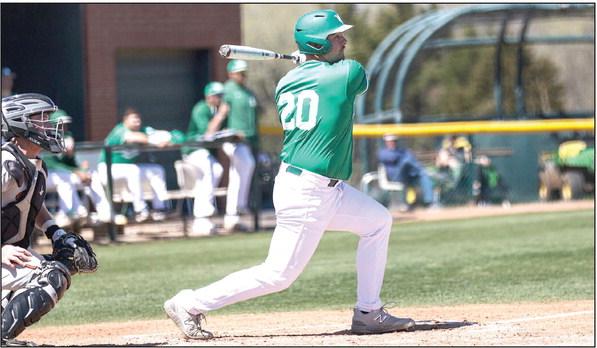 Oklahoma Baptist University’s Kade Self knock the ball into play in action against Northeastern State Tuesday, May 2. OBU won 12-7 and will take on Arkansas Tech Friday, May 5 in the Great American Conference Tournament. Photo provided