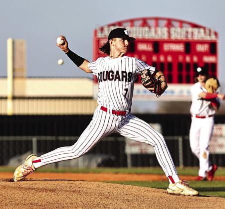 North Rock Creek’s starting pitcher Landon Kelough warms up for the season opener against Harrah Friday, Mar. 1. NRC won 7-4.