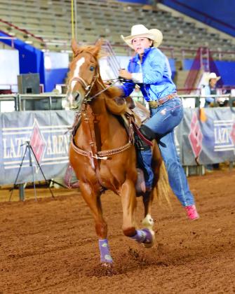 Tecumseh Middle School student Kambrie Koester competes on her horse, Quick Trip, in goat tying. Koester recently won Little Britches National Finals Rodeo Reserve World Champion Junior Goat Tyer. Photo provided
