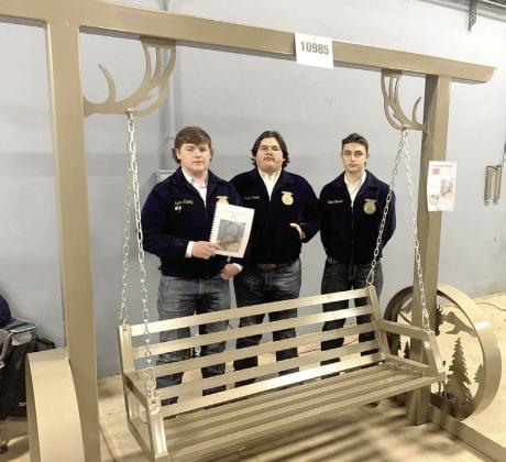 Dale FFA members Tucker Kluding, Joe Duello, and Grayden Flowers entered a metal swing, which they designed and built, in the 2023 OYE Ag Mechanics Competition. The swing placed third in class 12 of the Outdoor Recreation &amp;amp; Convenience Division. Photo provided.