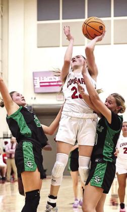North Rock Creek's Kadence Munn sinks in two of her 17 points in the home game against Seminole. The Lady Cougars dominated the Chieftains in the 75-10 win. Photo Courtesy of Gowin Photography