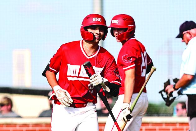 North Rock Creek’s Alexander Monge was all smiles with his in the park home run. Photos courtesy of Gowin Photography