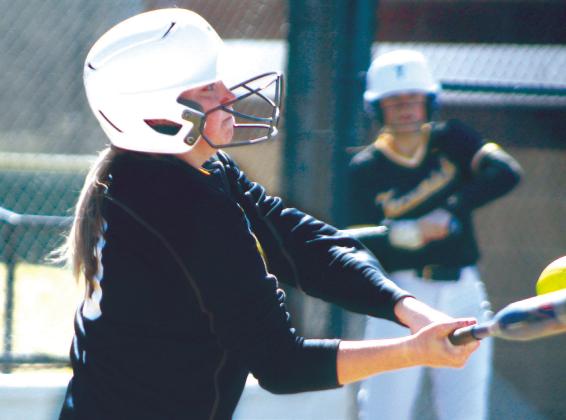 Tecumseh junior Cadence Oliver hits a single in the game against North Rock Creek during the Harrah Tournament, held at the FireLake Ball Fields on March 24. The Tecumseh Lady Savages lost 2-4. Countywide &amp;amp; Sun/Natasha Dunagan