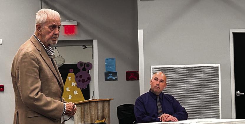 Donald Rominger (left) addresses the board while Superintendent Robert Kinsey listens intently Countywide &amp;amp; Sun/Suzie Campbell