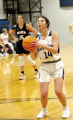 Asher’s Alexis Johnston aims for a foul shot during the home game on Nov. 10. The Lady Indians won, 52-22, and later that night, the Indians also won, 60-38. Countywide &amp; Sun/Natasha Dunagan