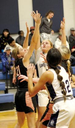 Asher’s Delanie Templeton shoots past Paden’s defenses during the home game on Nov. 10.