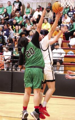 Earlsboro's Nate Ruiz tries for a bucket during the first quarter of the Nov. 7 home game against Varnum. The Wildcats lost 35-53.