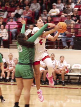 Earlsboro's Lilly Gentry goes up for a shot but draws the foul during the fourth quarter of the Nov. 7 home game against Varnum. The Lady Wildcats lost 39-50.