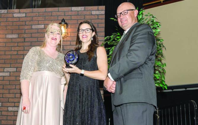 Lacey Holt, Executive Director of Legacy Parenting Center, receiving The LIVE UNITED award from Sandy Vanderburg and Casey Bell. Photo provided